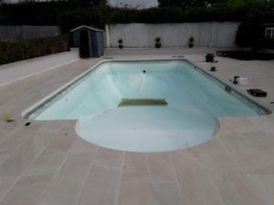 Swimming pool with old pool liner