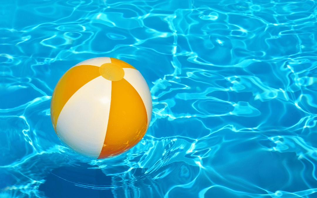 Beach ball in a swimming pool