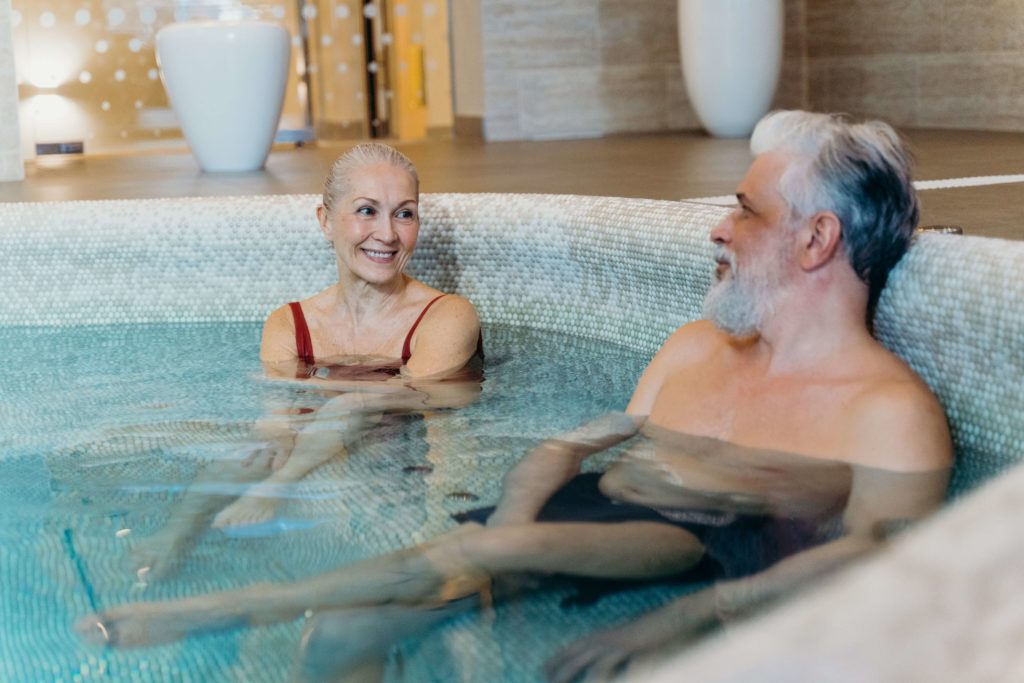 Couple using a hot tub