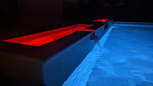 Swimming pool and water features with red lighting