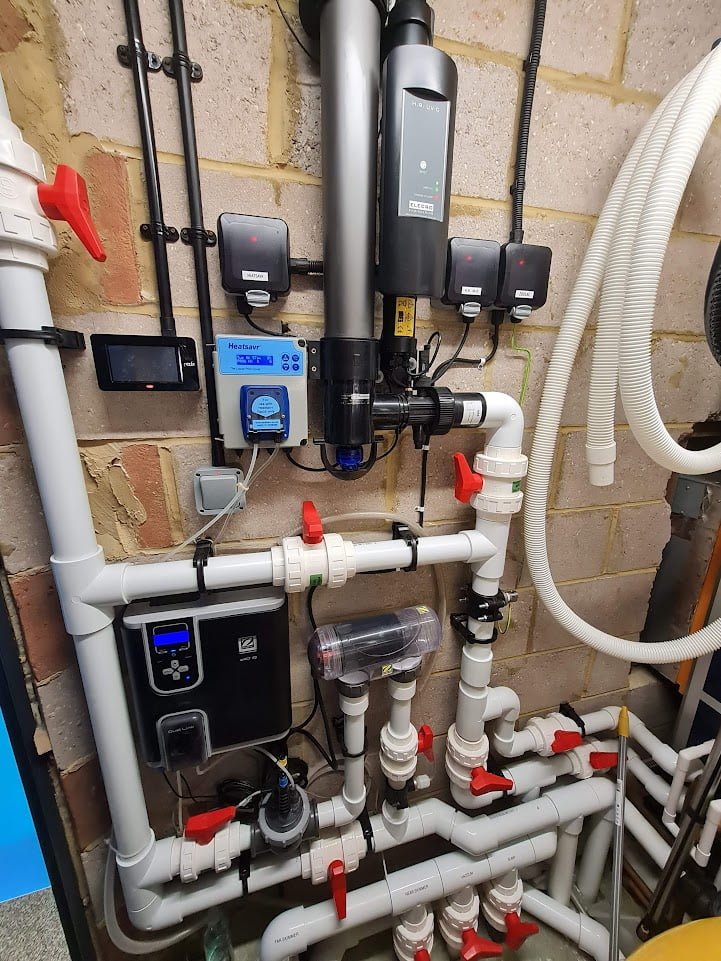 The plant room at our swimming pool construction job. Includes pipes and electronics
