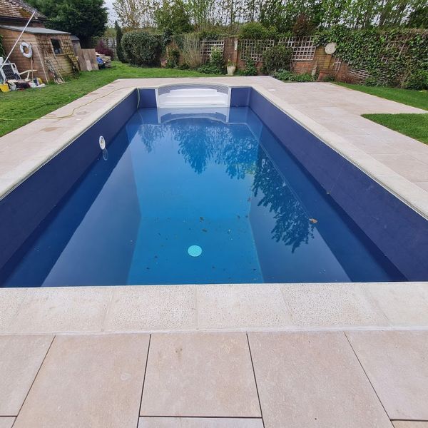 Swimming pool with leaves in