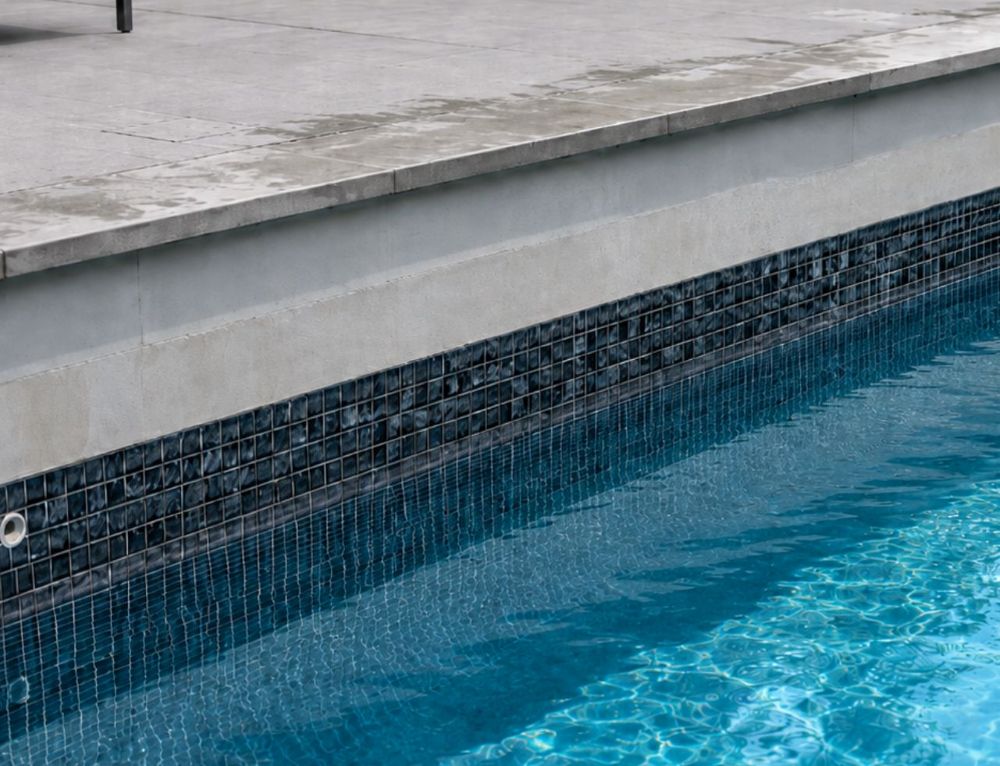 pool water level dropping with damp patio tiles